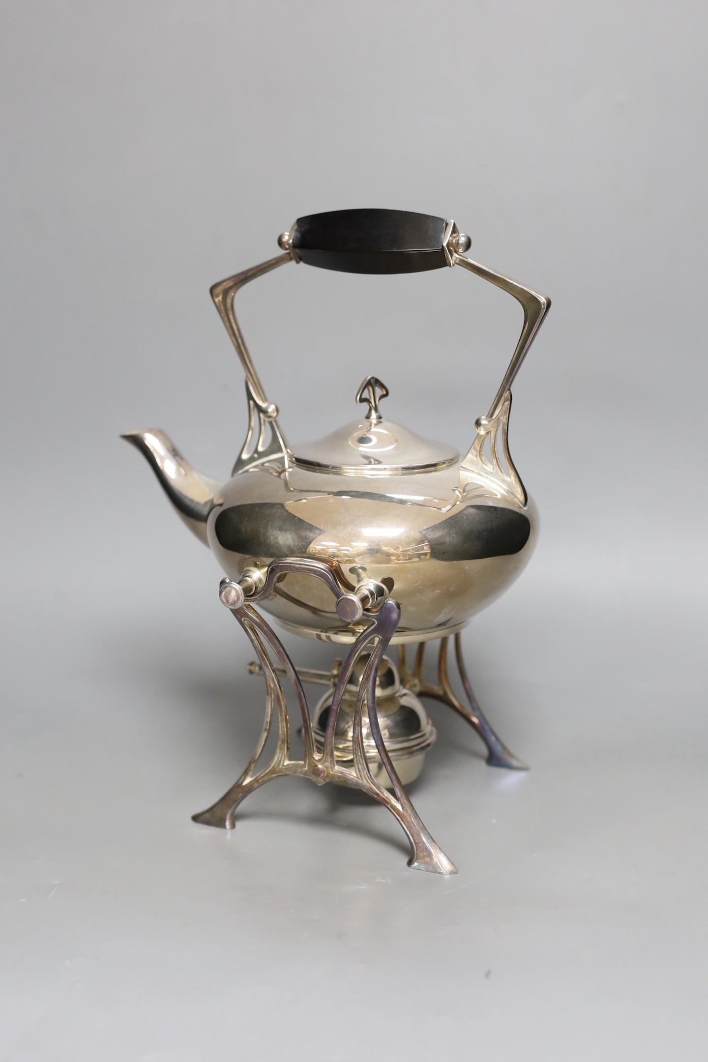 A WMF Art Nouveau silver plated kettle on stand, 29cm tall